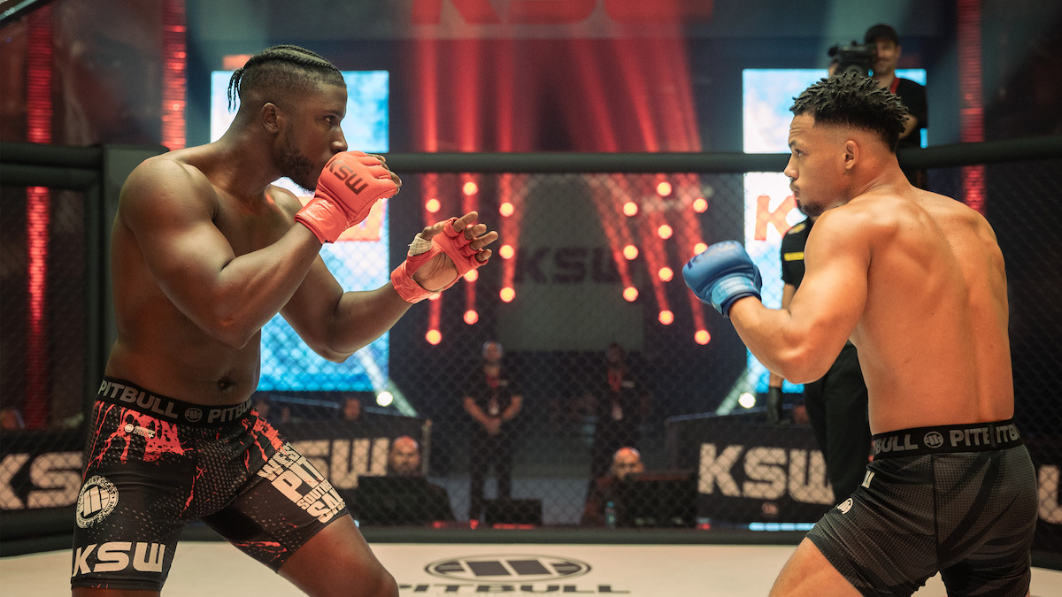  Bosh and Melvin Boomer square off in the ring in a scene from the series 'The Cage.'