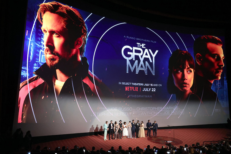 The stars of ‘The Gray Man’ line up to introduce the film inside the theater. - The Gray Man Premiere