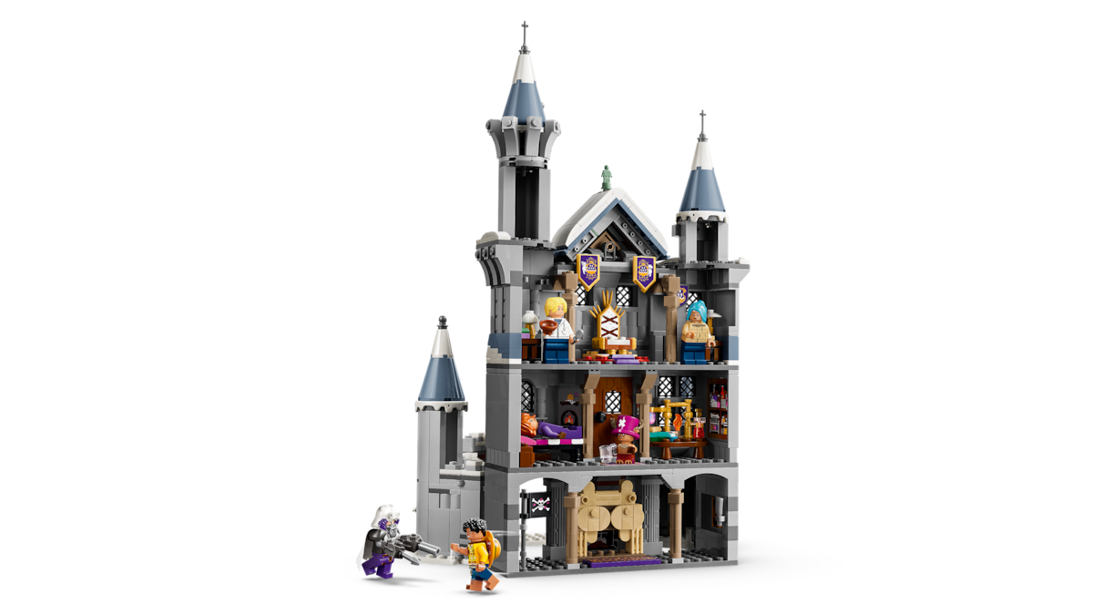LEGO ONE PIECE Battle at Drum Castle set with multiple mini-figures inside and outside, featuring detailed rooms, towers, and accessories, displayed against a plain background.