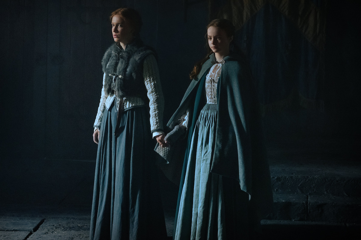 Millie Bobby Brown as Elodie and Brooke Carter as Floria in ‘Damsel’.