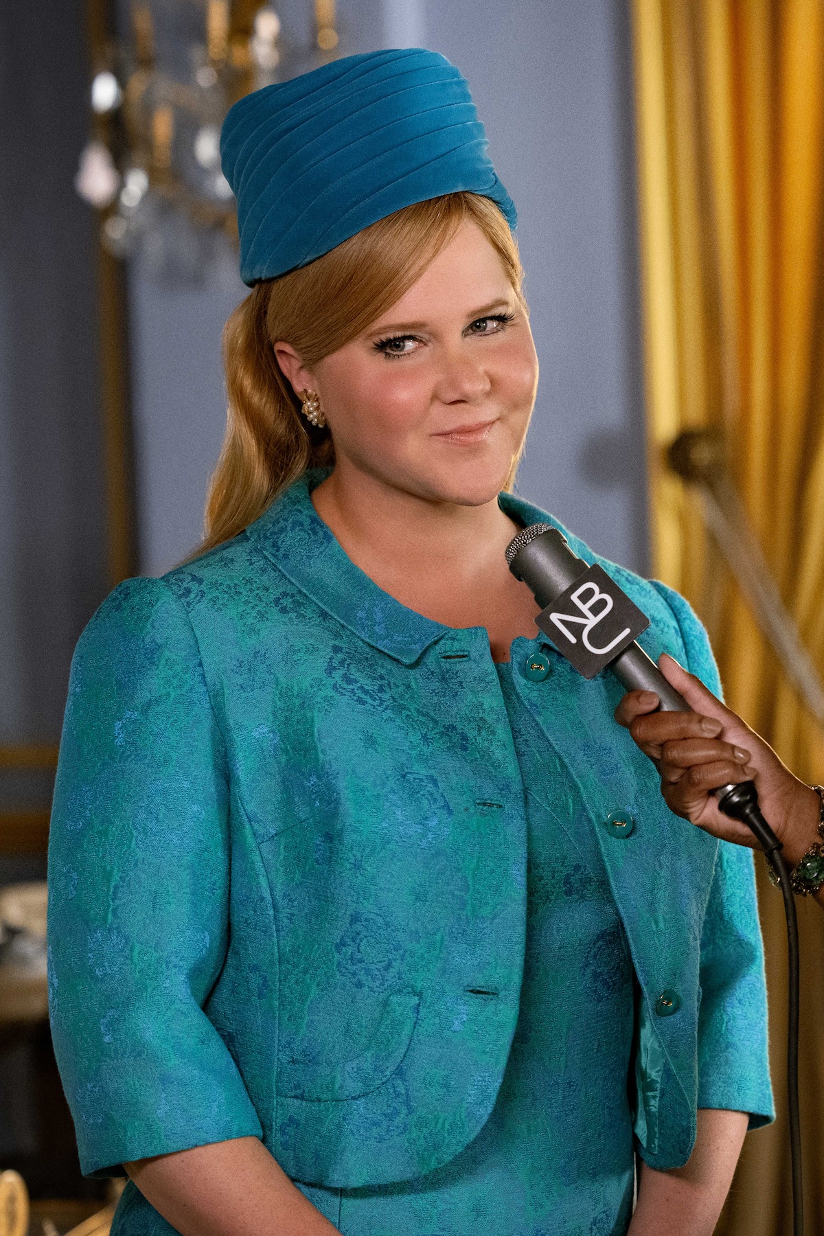 Amy Schumer as Marjorie Post in ‘Unfrosted.’
