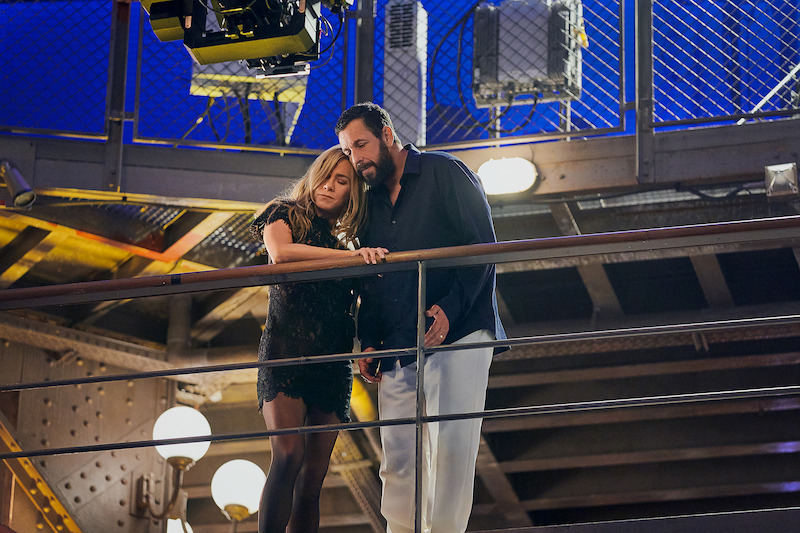 Adam Sandler as Nick Spitz and Jennifer Aniston as Audrey Spitz.