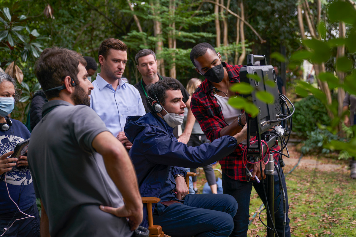 Justin Timberlake looks on as director Grant Singer prepares a scene in a still from the set of ‘Reptile.’