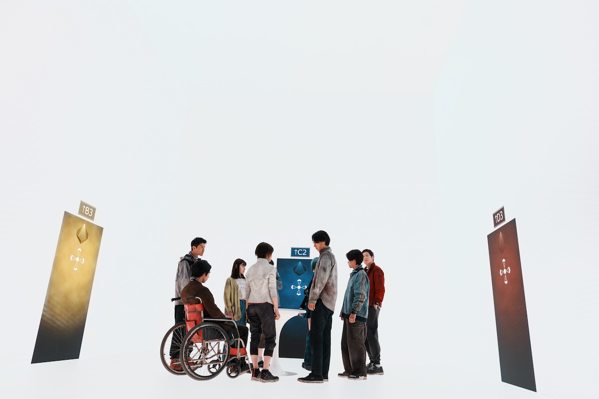 A group of people stand in an all-white space in an image from ‘Alice in Borderland’ Season 3.