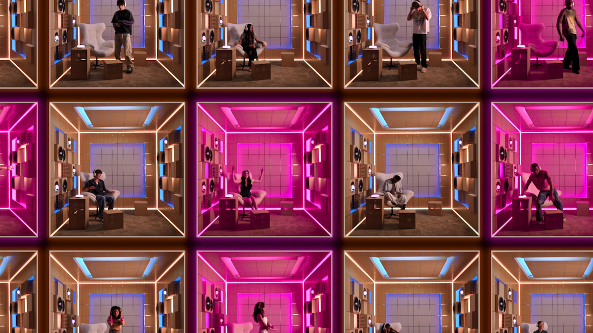 A grid of singers in their booths.