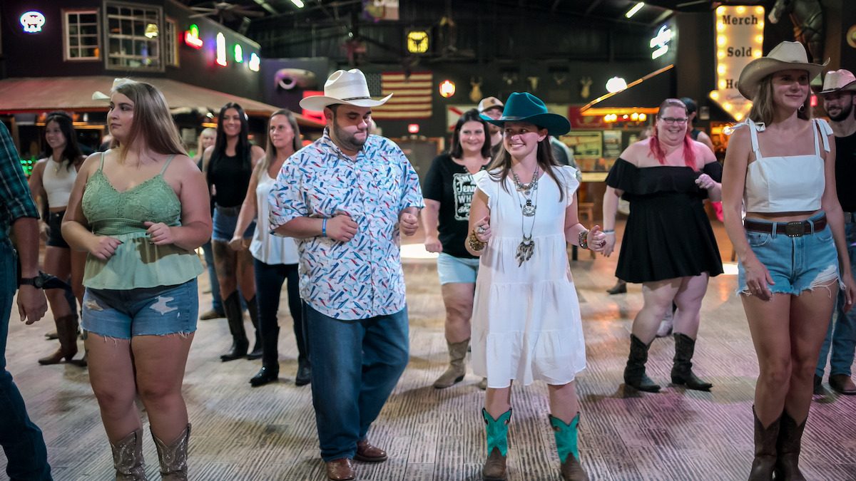 Tyler and Madison line dancing.