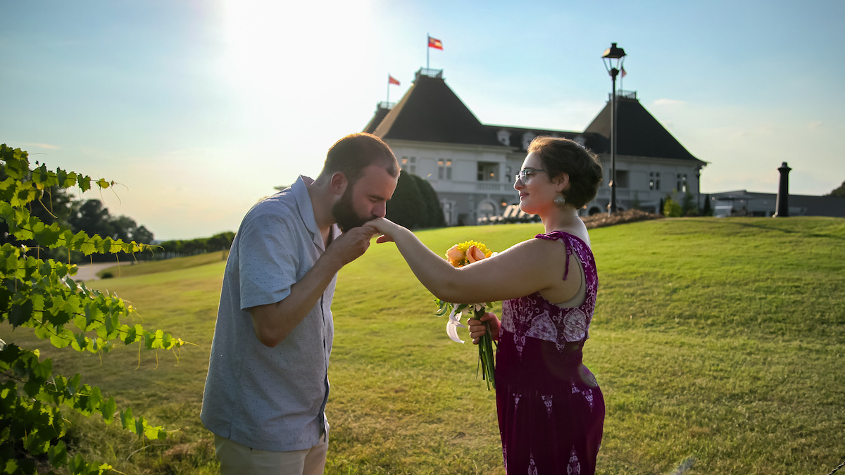 Connor kisses Georgie’s hand on a date.