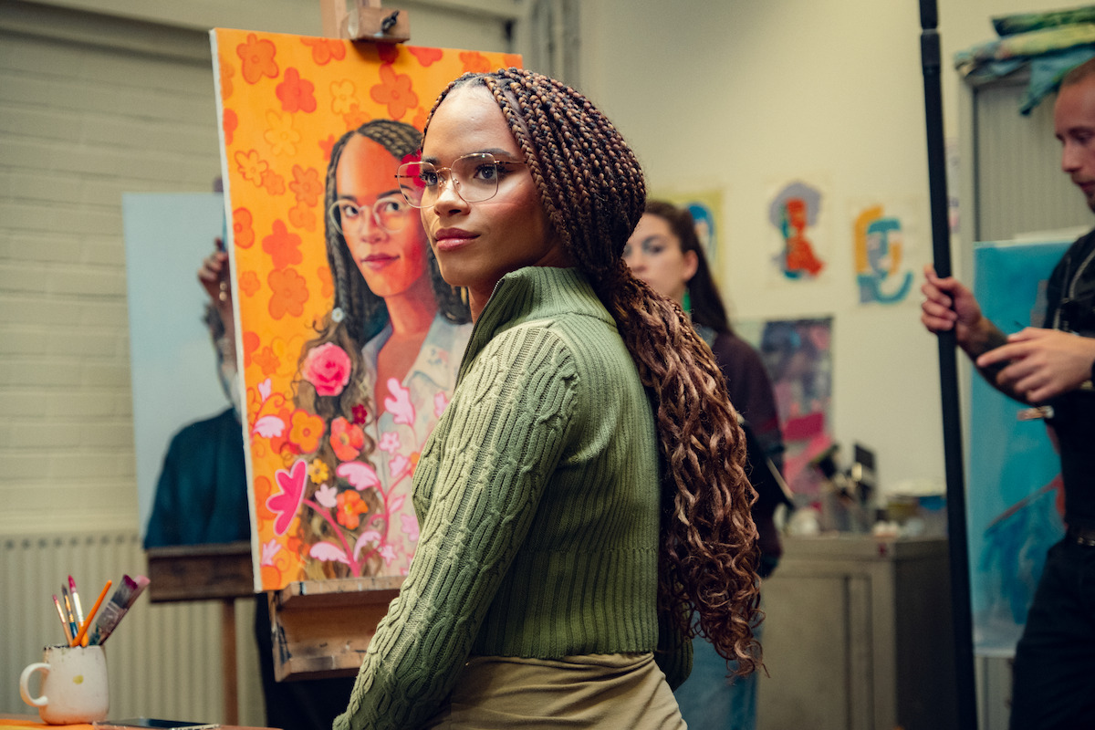Yasmin Finney as Elle paints a self-portrait in Season 3 of ‘Heartstopper.’