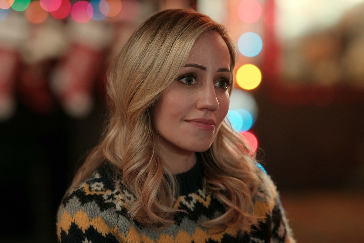 Zibby Allen as Brie Sheridan stands with a concerned expression in Season 5 of ‘Virgin River.’