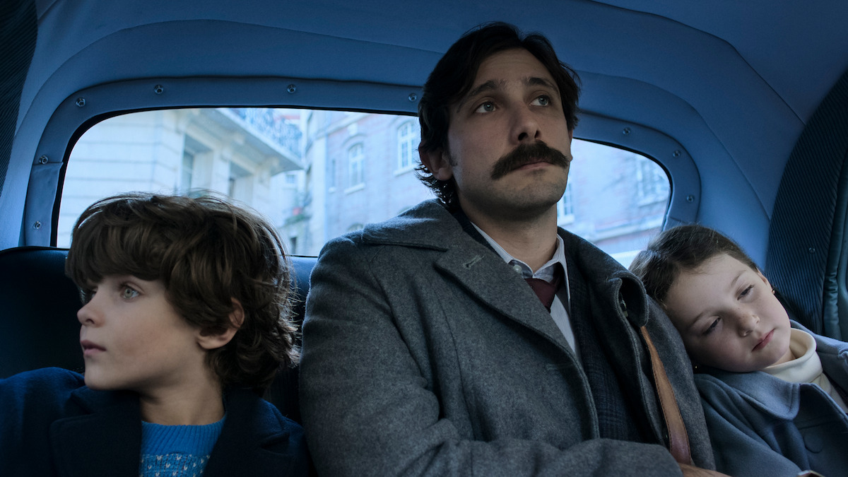 Marion Siro as Tamara, Emiliano Zurita as Leo, Alexander Varela as Isaac ride in the back of a car in ‘No One Saw Us Leave.’