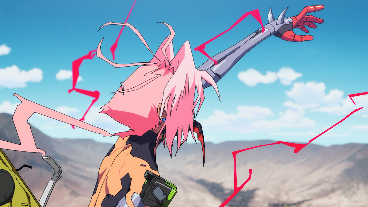 Anime character with pink hair and futuristic armor stands in a dynamic pose, with a mechanical arm extended, glowing red lines, and a mountainous landscape under a bright blue sky in the background.