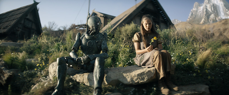 (L-R) Jimmy (Performed by Dustin Ceithamer/Voiced by Anthony Hopkins) and Charlotte Maggi as Sam in Rebel Moon. 