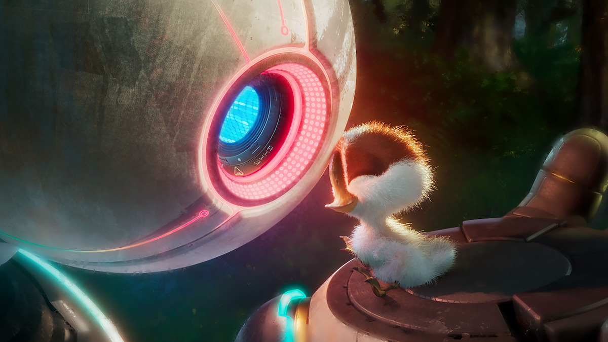 A still image from ‘The Wild Robot’ shows a robot and a duckling pressing their heads together.