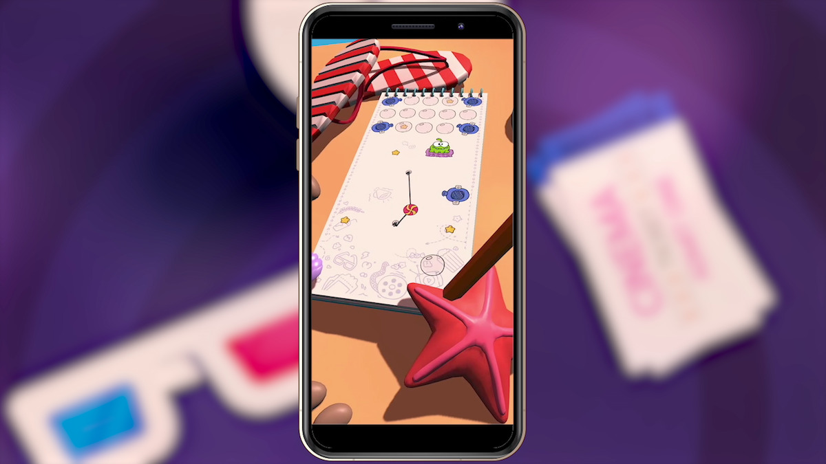 A screenshot of Cut the Rope Daily mobile game within the frame of an iPhone.