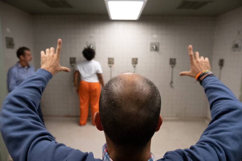 (L to R) Mark A. Burley (Director), Adrienne C. Moore as Cindy, Ludovic Littee (Director of Photography) on the set of Orange Is The New Black Season 6.