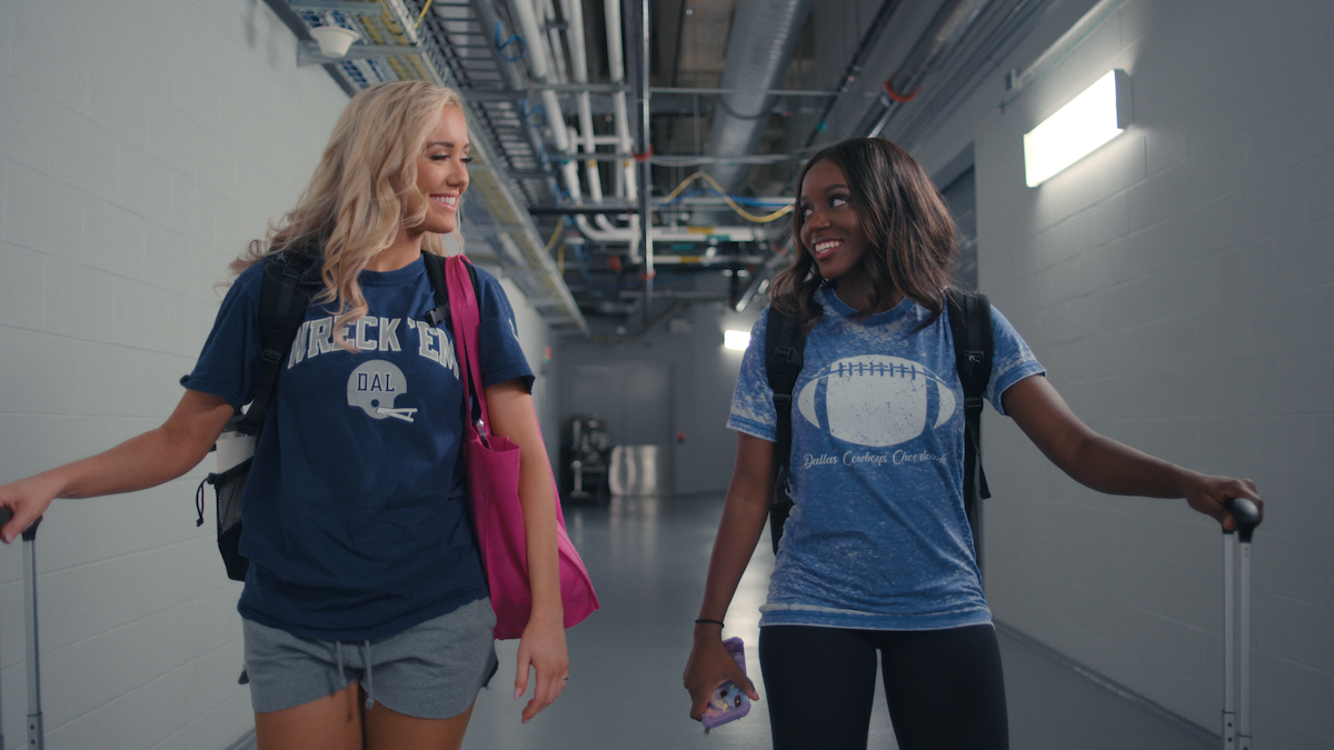 Tori walks down hall