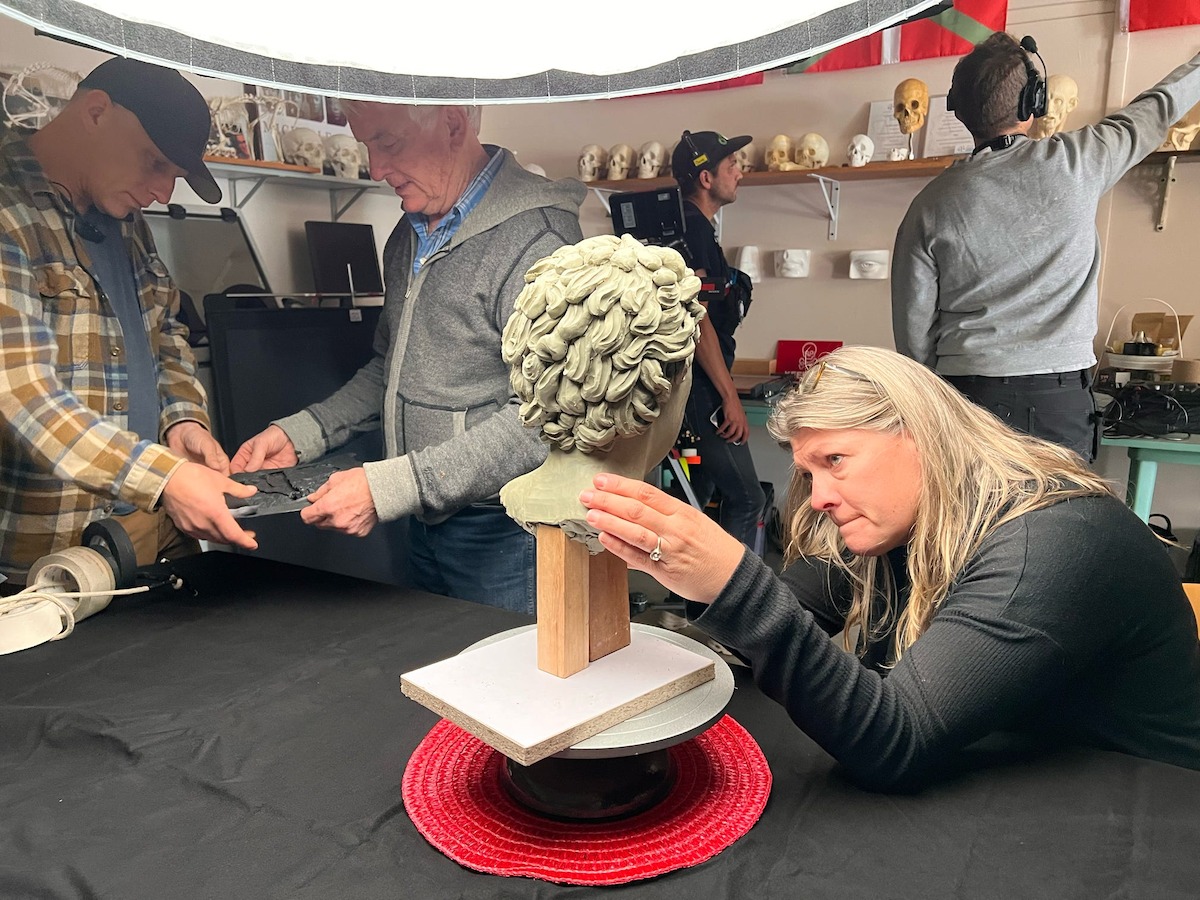 The Unsolved Mysteries crew works in Michelle Vitali's forensic art lab to film her creating a sculpture depicting Beaver County Jane Doe's appearance when alive.
