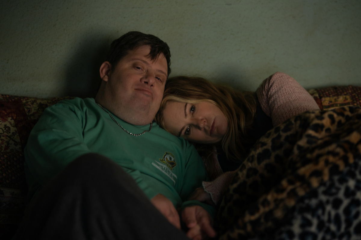 Zack Gottsagen as Kenny and Jennifer Jason Leigh as Doreen in ‘Night Always Comes.’