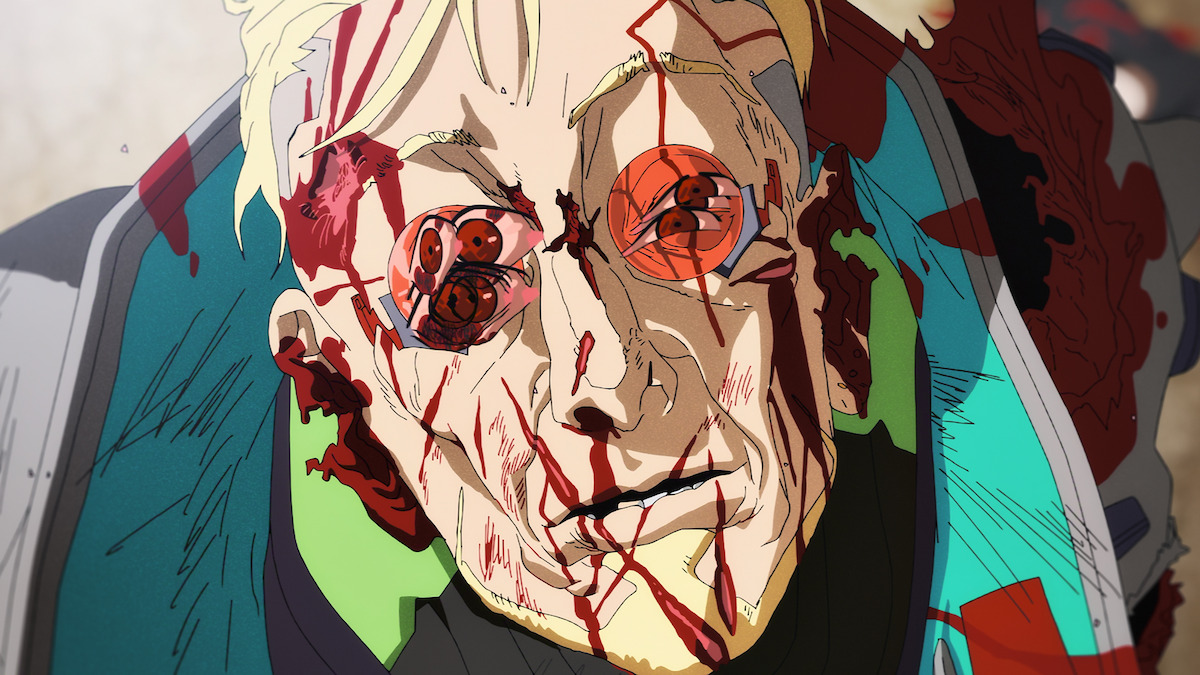 Anime-style character with cybernetic eyes, face and clothing bloodied, in a close-up shot, lying on the ground in a dramatic, violent scene.