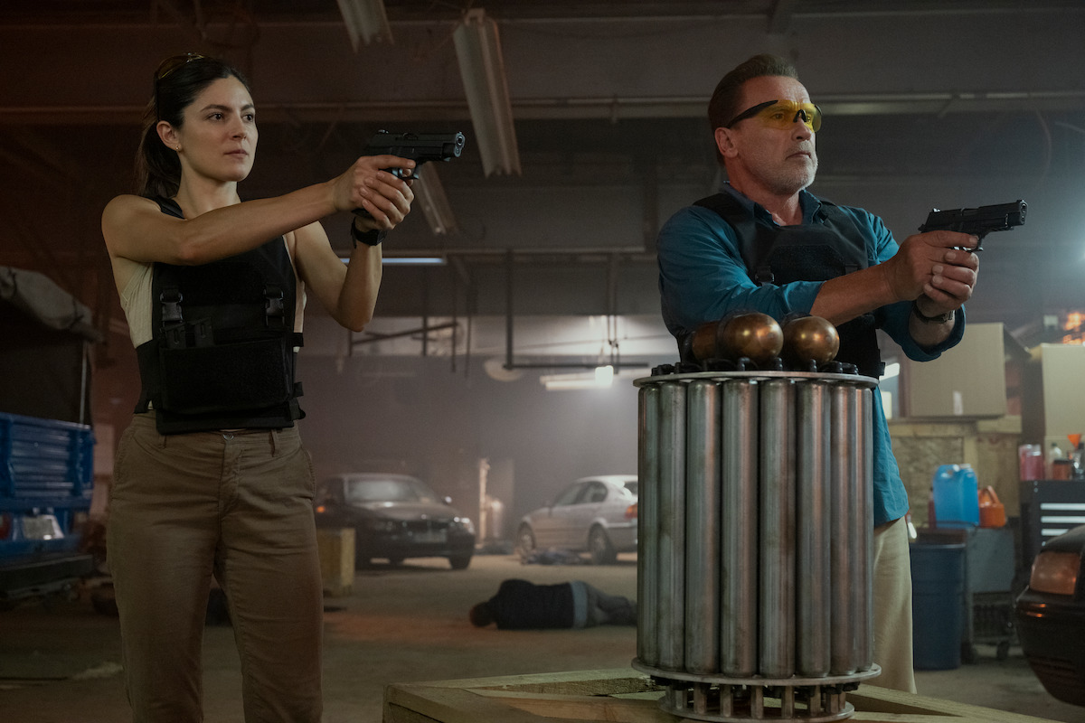 Monica Barbaro as Emma Brunner and Arnold Schwarzenegger as Luke Brunner in ‘FUBAR’ Season 1.
