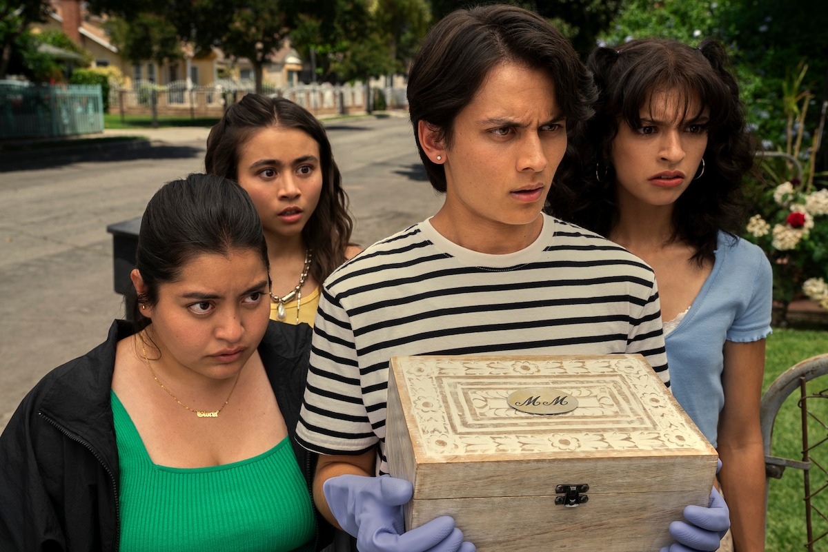 The cast of Freeridge carrying the ‘box’ and looking at someone off screen
