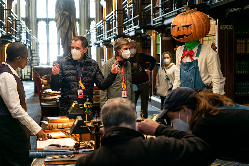 Lucienne (Vivienne Acheampong) and Merv (Nicholas Anscombe) listen to showrunner Allan Heinberg and director Andrews Baiz. Note the green fabric around Merv’s neck, to allow visual effects artists to add in a vine there (as Merv is a pumpkin).