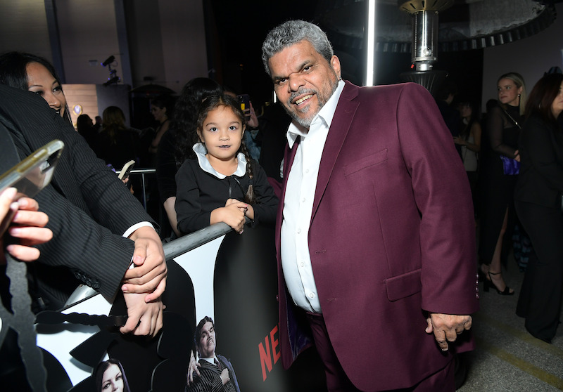 Guzmán poses with a fan