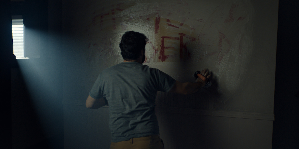Ian Ottis Goff as Matt Wilson drawing blood on the walls in ‘True Haunting.’