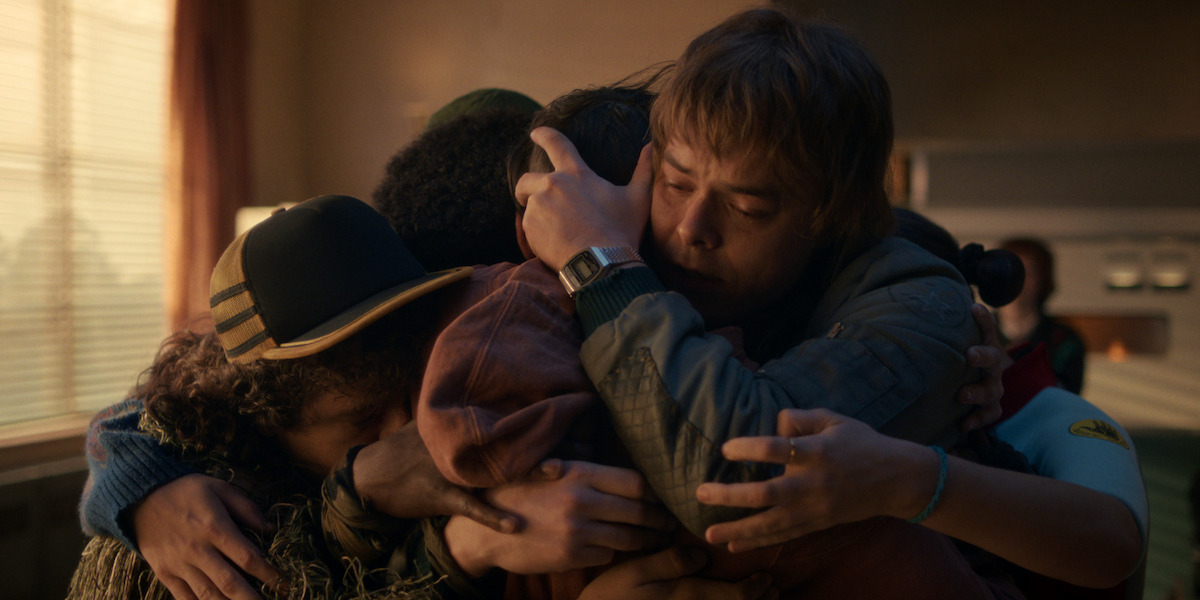 Noah Schnapp as Will Byers hugs his friends in ‘Stranger Things 5’