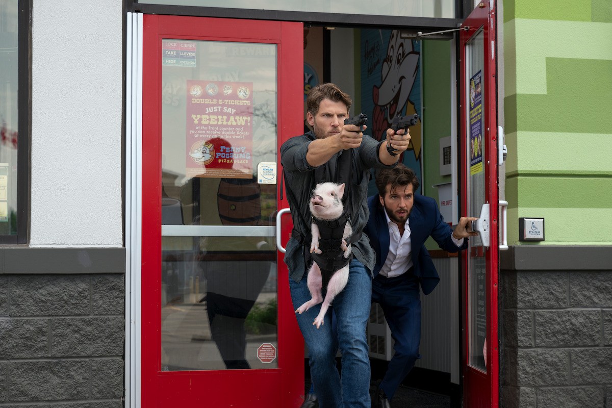 Travis Van Winkle as Aldon Reece, Guy Burnet as Theodore Chips, and Dexter as Hamsteak in ‘FUBAR’ Season 2.