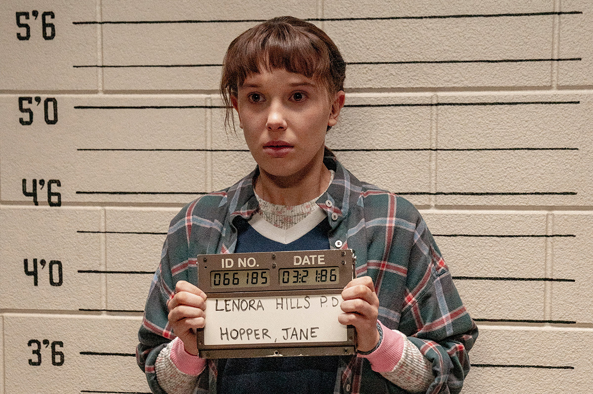  A teenage girl poses for a mugshot