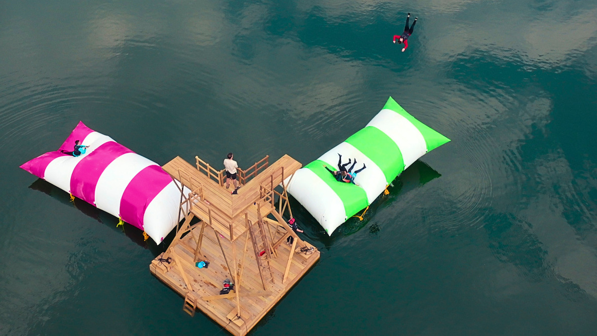 Players participate in a challenge on the water in ‘Battle Camp’