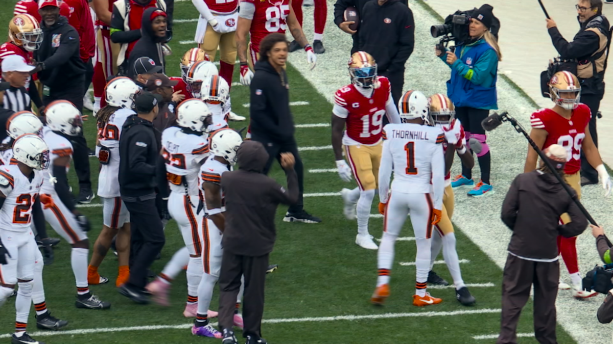Deebo Samuel walks up to protect a teammate during a confrontation.
