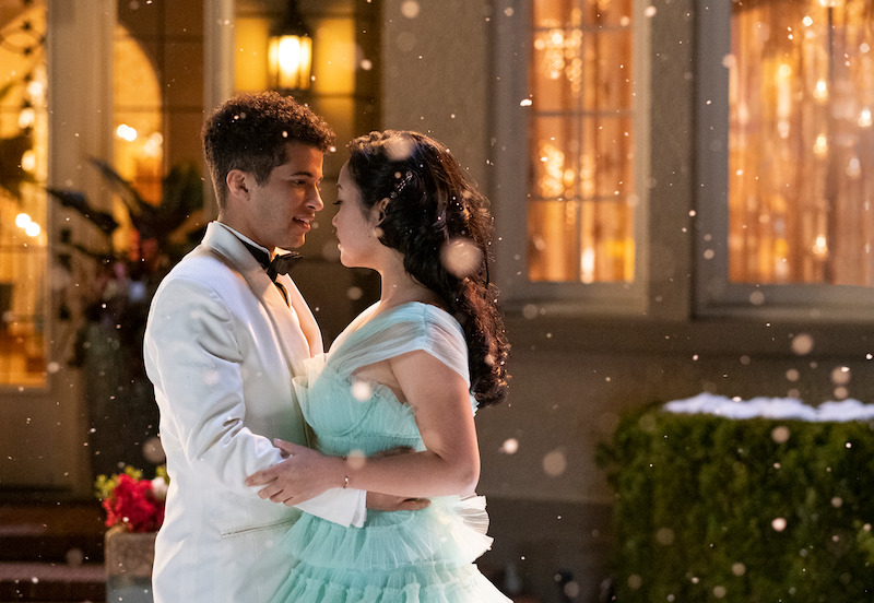 Jordan Fisher as John Ambrose and Lana Condor as Lara Jean dancing in the snow.