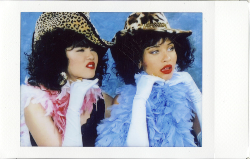 Sam Morelos (Nikki) and Ashley Aufderheide (Gwen) doll up for their glamour shots.