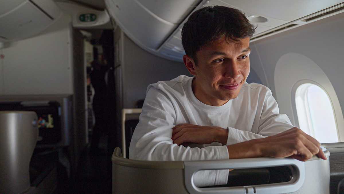 Alex Albon on a plane.