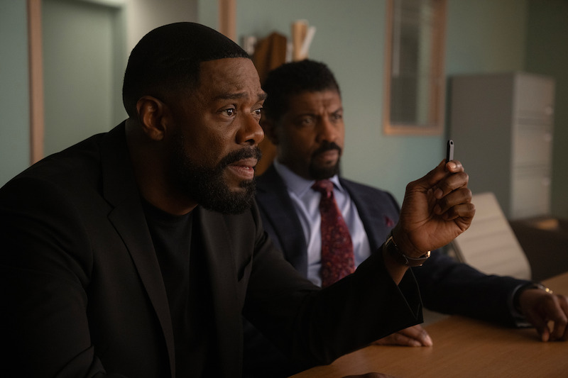 Colman Domingo as Muncie Daniels and Deon Cole as Kwesi Dupree sit in an office together in Season 1 of ‘The Madness.’ 