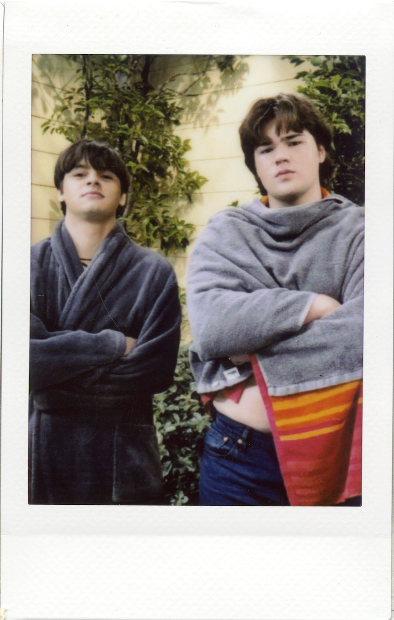 Mace Coronel (Jay) and Maxwell Acee Donovan (Nate) drying off on the set.