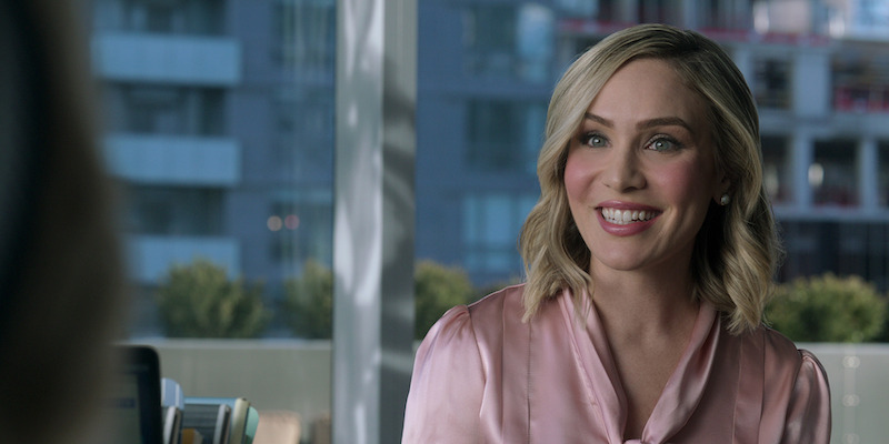 Trina smiles. 