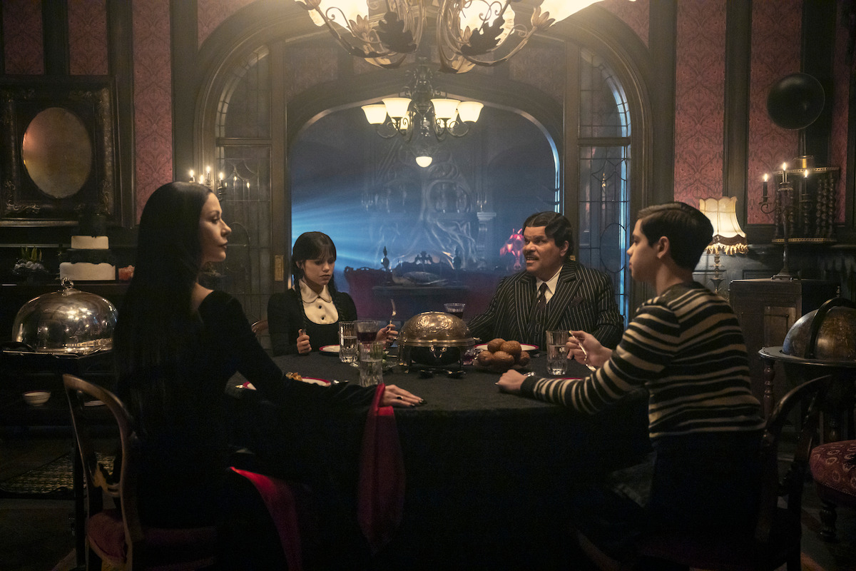 Catherine Zeta-Jones as Morticia Addams, Jenna Ortega as Wednesday Addams, Luis Guzmán as Gomez Addams, and Isaac Ordonez as Pugsley Addams in ‘Wednesday’ Season 2.