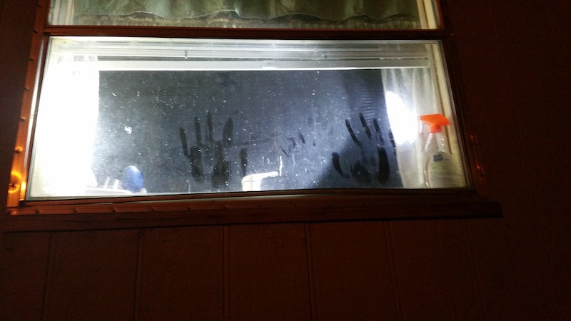 Photo of a bigfoot handprint on the window of a trailer in Upper Fruitland, NM, provided by Brenda Harris. - Evidence of Bigfoot