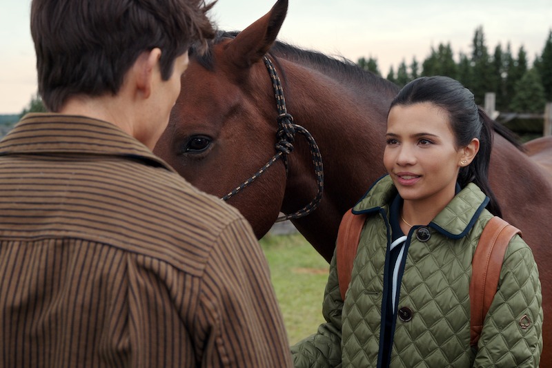 Gentry as Alex and Rodriguez as Jackie with a brown horse in 'My Life with the Walter Boys' Season 2