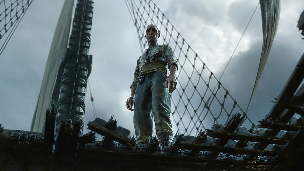 A sailor looks down into a hole in a ship deck in ‘Bad Travelling’ from ‘Love, Death, + Robots’ Volume 3