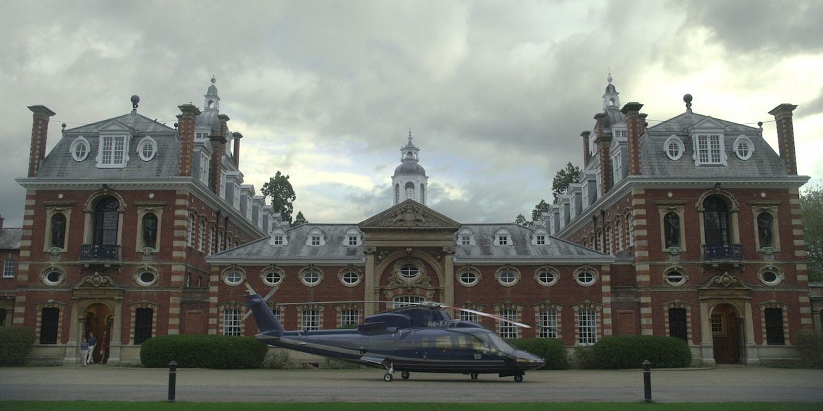 Helicopter landing in front of house