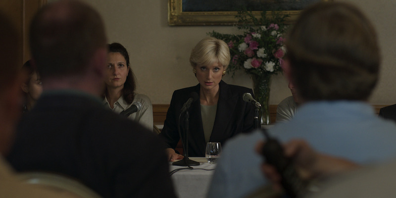 Black jacket over khaki blouse 