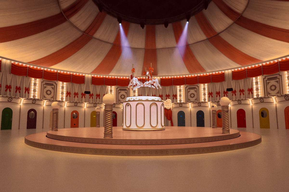 Whimsical circus interior with striped tent ceiling, colorful doors, bright lights, and a central stage featuring white carousel horses. The setting feels festive, theatrical, and cheerful.