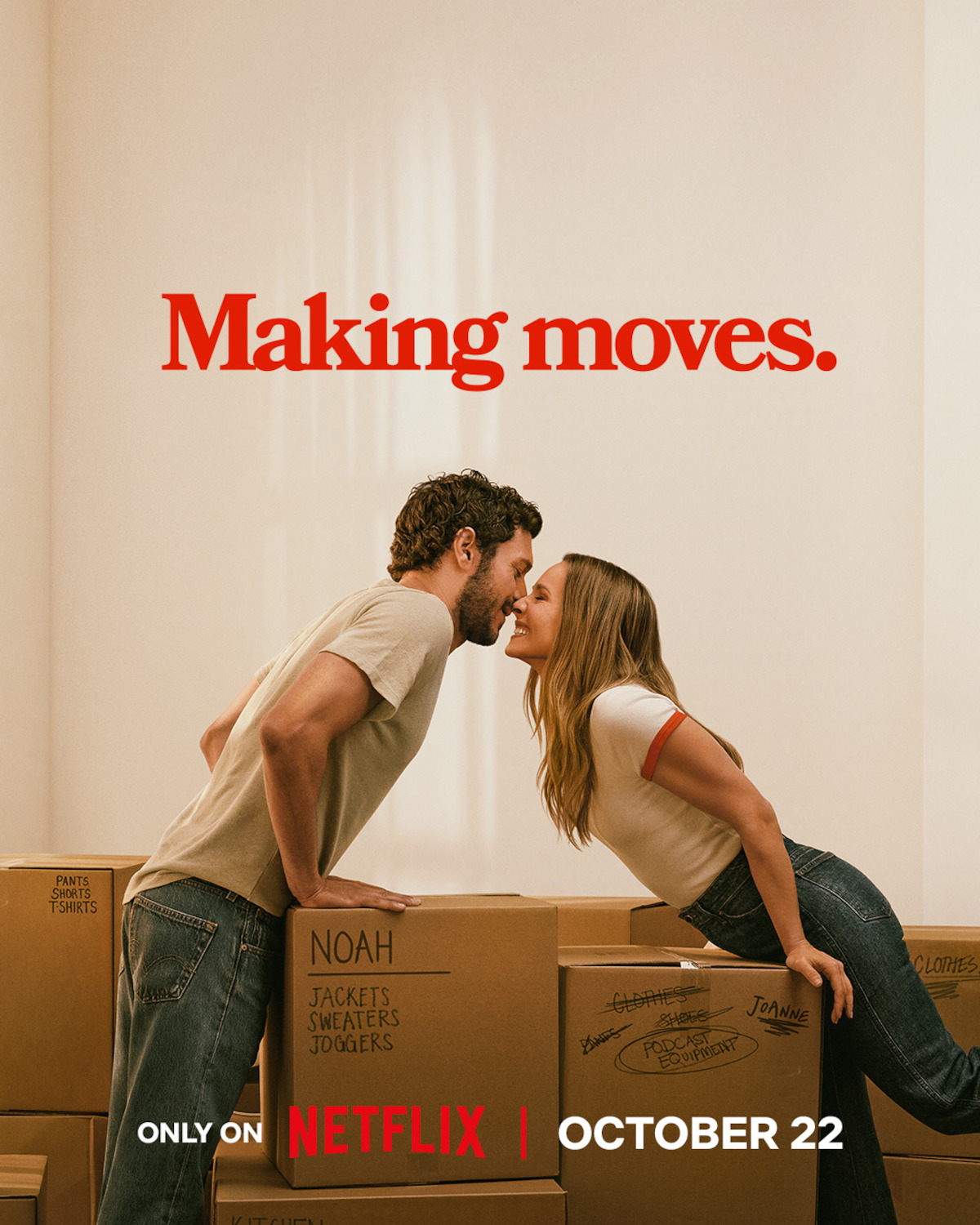 A couple leans in to kiss while surrounded by moving boxes in a new home, with the phrase "Making moves." above them. The Netflix logo and an October 22 release date are also displayed.