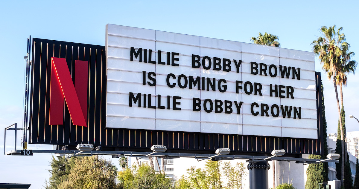 Sunset Blvd Billboard for Damsel that reads ‘Millie Bobbie Brown is coming for her Millie Bobby Crown.’