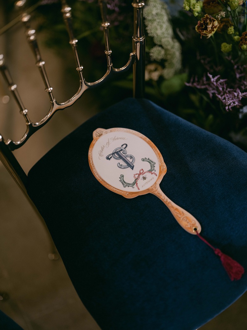 A mirror rests on a seat in 'The Event of the Season: A Bridgerton Wedding'