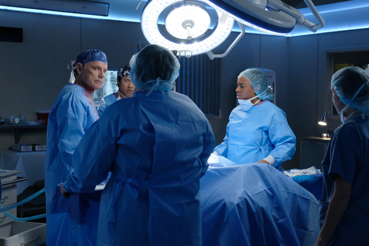 Bruce Greenwood as Randolph Bell conducts a surgery with a team of doctors in ‘The Resident.’
